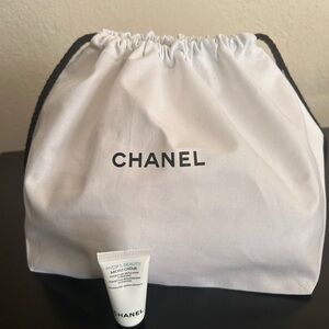 CHANEL White and Black Drawstring Bag with beauty item